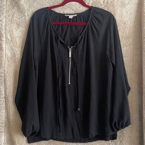 Black Michael Kors top.